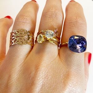 Gold tone purple crystal 5 ring set size 7